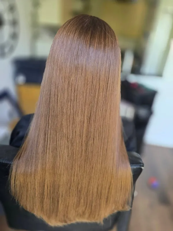 Glossy caramel brown, long and straight